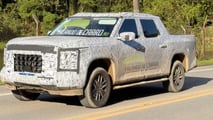 Flagra lateral da Volkswagen Amarok 2027 revelando suspensão traseira