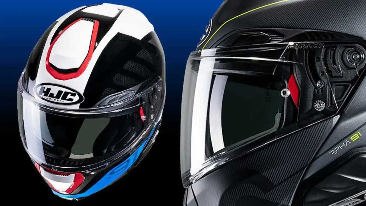 Três capacetes de motocicleta modernos da HJC, destacando diferentes designs e grafismos.