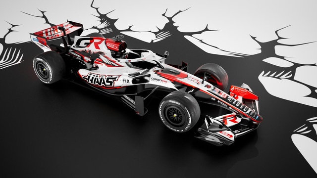 Carro da Haas F1 com pintura especial de Godzilla e sua respiração atômica